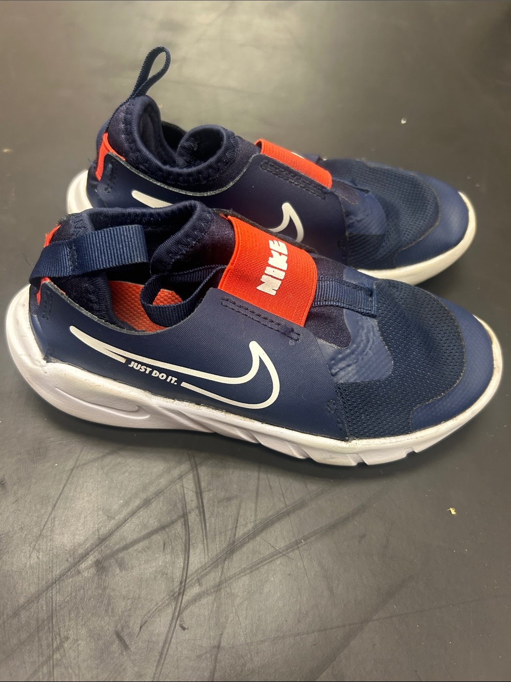 Nike Kids Navy and Orange Slip-On Sneakers with White Swoosh
